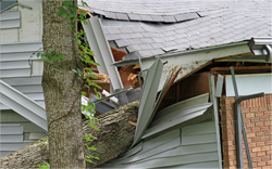 Image of a roof destroyed by a storm.